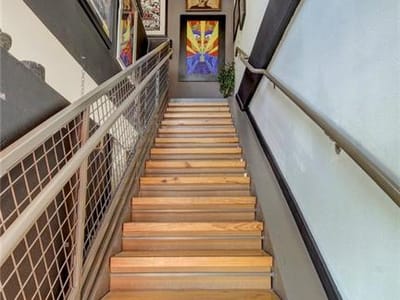 Primary bedroom at 1601 E Cesar Chavez St Unit #106 - Waterstreet Lofts, Austin, TX