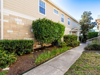 Primary bedroom at 16100 S Great Oaks DR Unit #102 - 2 bed 2 bath home