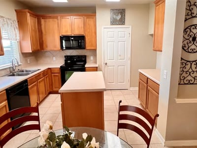 Primary bedroom at 16616 Bridgefarmer Blvd - 4 bed 2 bath home