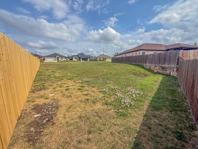 Primary bedroom at 169 Greg Ln - Home Place/Jarrell 2nd Minor A, Jarrell, TX