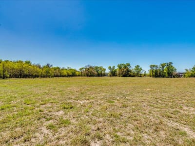 Primary bedroom at 169 Sand Hill RD - Campbell Creek Acres, Dale, TX