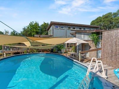 Primary bedroom at 16933 #B  Ranch Rd 12 #B - Hogg Creek Bus Park, Wimberley, TX