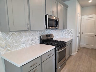 Kitchen at 17100 Carmel Cricket DR Unit #C - 3 bed 2 bath home