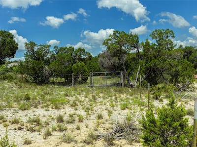 Primary bedroom at 179 Shawnee TRL - Poundhouse Hills Sec 2, Dripping Springs, TX
