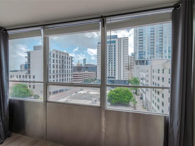 Primary bedroom at 1800 Lavaca St Unit #A705 - 1 bed 1 bath home