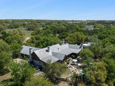 Aerial view - 18059 FM 1826 Rd Aerial view with estate aerial at 18059 FM 1826 Rd - Grand Cypress At Onion Creek, Driftwood, TX