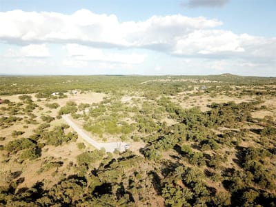 Primary bedroom at 181 Kadens Blf - The Bl Uffs At Round Mountain, Round Mountain, TX