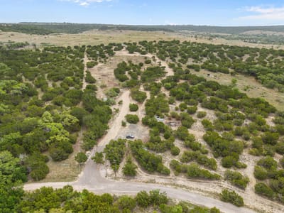 Primary bedroom at 182 Quail Creek Rd - Mountain Creek Ranch, Marble Falls, TX