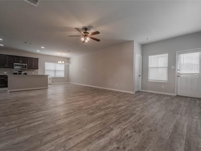 Living area at 18427 Stevie Ray DR - 4 bed 2 bath home