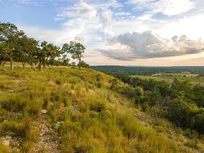 Primary bedroom at 1853 Paradise Pkwy - Paradise on the Guadalupe, Canyon Lake, TX