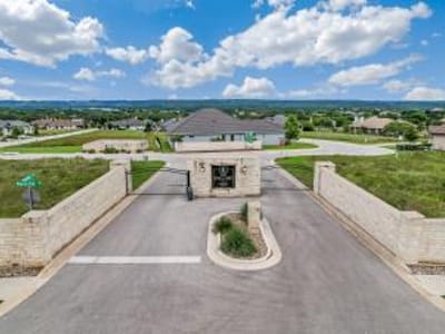 Living area at 1856 Art Adams WAY - The Enclave at Barton Creek Lakeside, Spicewood, TX