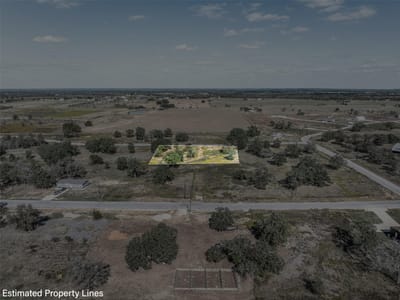 Primary bedroom at 189 Ferguson Loop - Cool Water Acres, Dale, TX