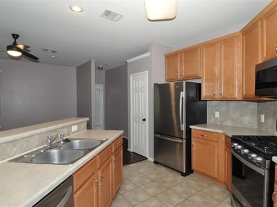 Living area at 1900 Scofield Ridge Pkwy Unit #5403 - 2 bed 2 bath home