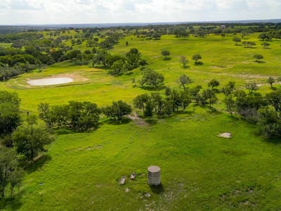 Primary bedroom at 191 Pivot Cir - Miller Creek Ranch, Briggs, TX