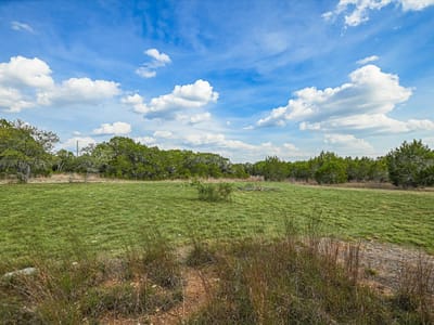 Primary bedroom at 1935 Wayside DR - Blanco River Ranch Estates, Wimberley, TX