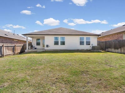 Primary bedroom at 19916 Ann Richards Ave - 4 bed 2 bath home