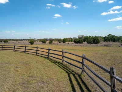 Primary bedroom at 200 Stonehouse Dr - Stone House Estates, Liberty Hill, TX