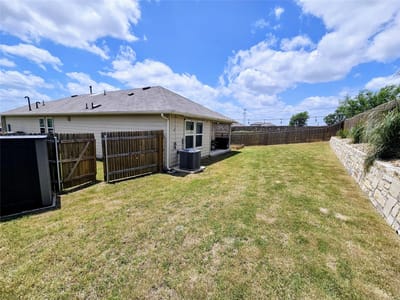 Primary bedroom at 201 Elbow Bush CV - 3 bed 2 bath home