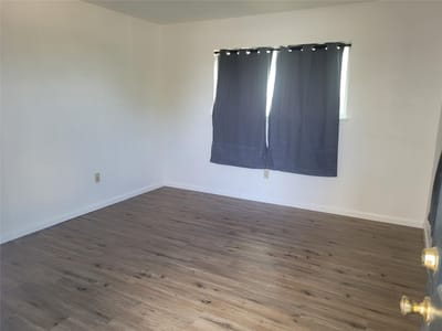 Living area at 205 2nd Ave Unit #1 & 2 - Mt Pleasant, Smithville, TX