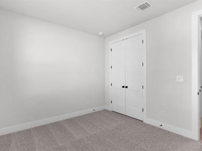 Primary bedroom at 209 West Faulkner ST - 4 bed 3 bath home