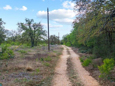 Primary bedroom at 2124 Bugtussle Ln - NONE, Luling, TX