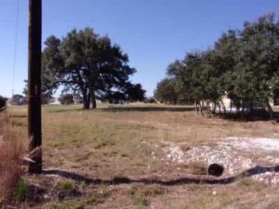 Primary bedroom at 216 N Calvin Barrett Dr - ROCKIN J RANCH, Blanco, TX