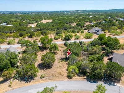 Primary bedroom at 222 Wesley Ridge Dr - The Point At Ridge Harbor, Spicewood, TX