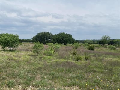 Primary bedroom at 225 County Road 2227 - North Lamp Estates, Lampasas, TX