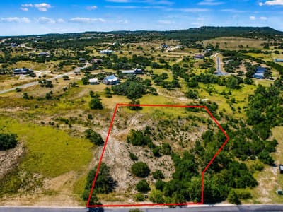 Primary bedroom at 228 Bosque TRL - Summit Springs, Marble Falls, TX