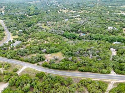 Primary bedroom at 23070 Pedernales Canyon TRL - Lick Creek Ranch, Spicewood, TX