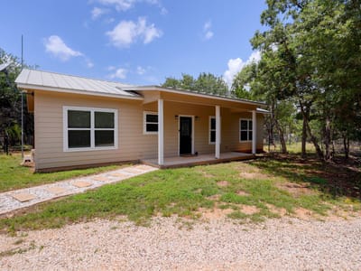 Living area at 231 N Rainbow Ranch RD - 3 bed 2 bath home