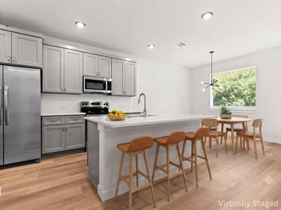 Kitchen at 2600 Gattis School RD Unit #301 - 504 - Townhomes at Gattis Condos, Round Rock, TX