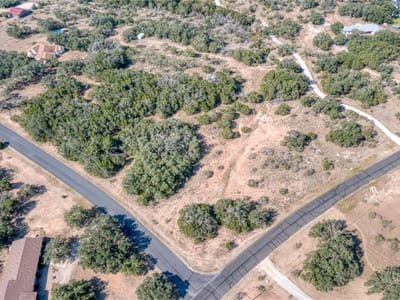 Primary bedroom at 2600 Indian Divide Rd - Paleface Ranch Sec 03, Spicewood, TX