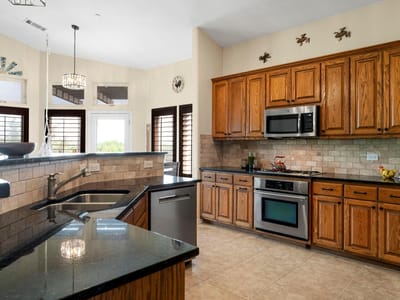 Kitchen at 2601 N Quinlan Park Rd Unit #401 - 2 bed 2 bath home