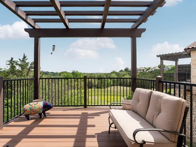 Primary bedroom at 2601 N Quinlan Park Rd Unit #401 - 2 bed 2 bath home