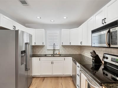 Kitchen at 2605 Enfield Rd Unit #221 - 2 bed 2 bath home