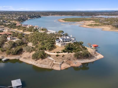 Aerial view - 26100 Countryside Dr Aerial view with lakefront peninsula property at 26100 Countryside Dr - 5 bed 5 bath home
