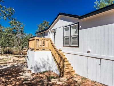 Primary bedroom at 264 Flaming Oak Dr Unit #A & B - HOLIDAY HILLS, Bastrop, TX