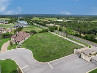 Primary bedroom at 26612 Haynie Flat RD - The Enclave at Barton Creek Lakeside, Spicewood, TX