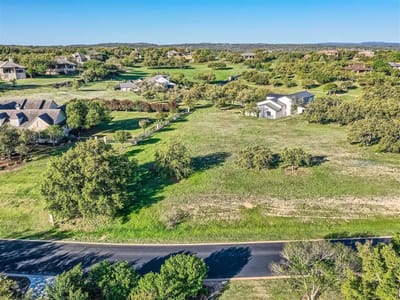 Primary bedroom at 27209 Waterfall Hill Pkwy - Barton Creek Lakeside, Spicewood, TX