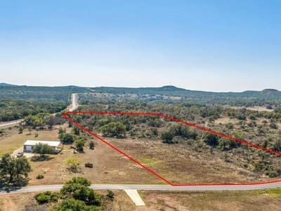 Primary bedroom at 285 Comanche Ridge Rdg - THE BLUFFS, Blanco, TX
