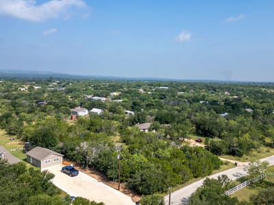 Primary bedroom at 297 Link DR - River View, Kingsland, TX