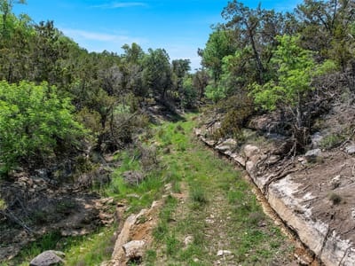 View - 29911 Ranch Road 12 View with Hill Country creek views at 29911 Ranch Road 12 - Anthony G Davy, Dripping Springs, TX