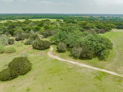Primary bedroom at 3 Becky Ln - Benjamin McKinney Surv #3 Abs, Bertram, TX