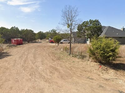 Primary bedroom at 3 Moonlight Ln - Woodcreek Sec 19, Wimberley, TX