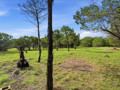 Primary bedroom at 30 Meadow Oak CT - Woodcreek Sec 12, Wimberley, TX
