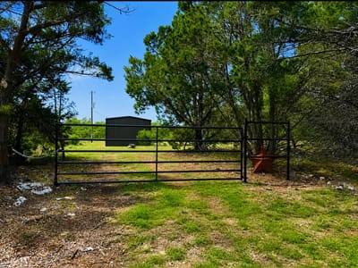 Primary bedroom at 300 Live Oak Hills CT - Rancho Encino Ph I, San Marcos, TX