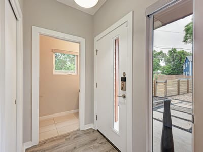 Primary bedroom at 3008 E 14th 1/2 ST Unit #A - 4 bed 2 bath home