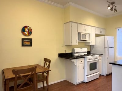 Primary bedroom - 303 W 35th St Unit #202 Primary bedroom at 303 W 35th St Unit #202 - 1 bed 1 bath home