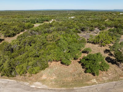 Primary bedroom at 304 Stonegate Ln - Stonegate At Dripping Spgs, Dripping Springs, TX